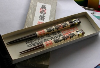 Как закалывать палочки для волос